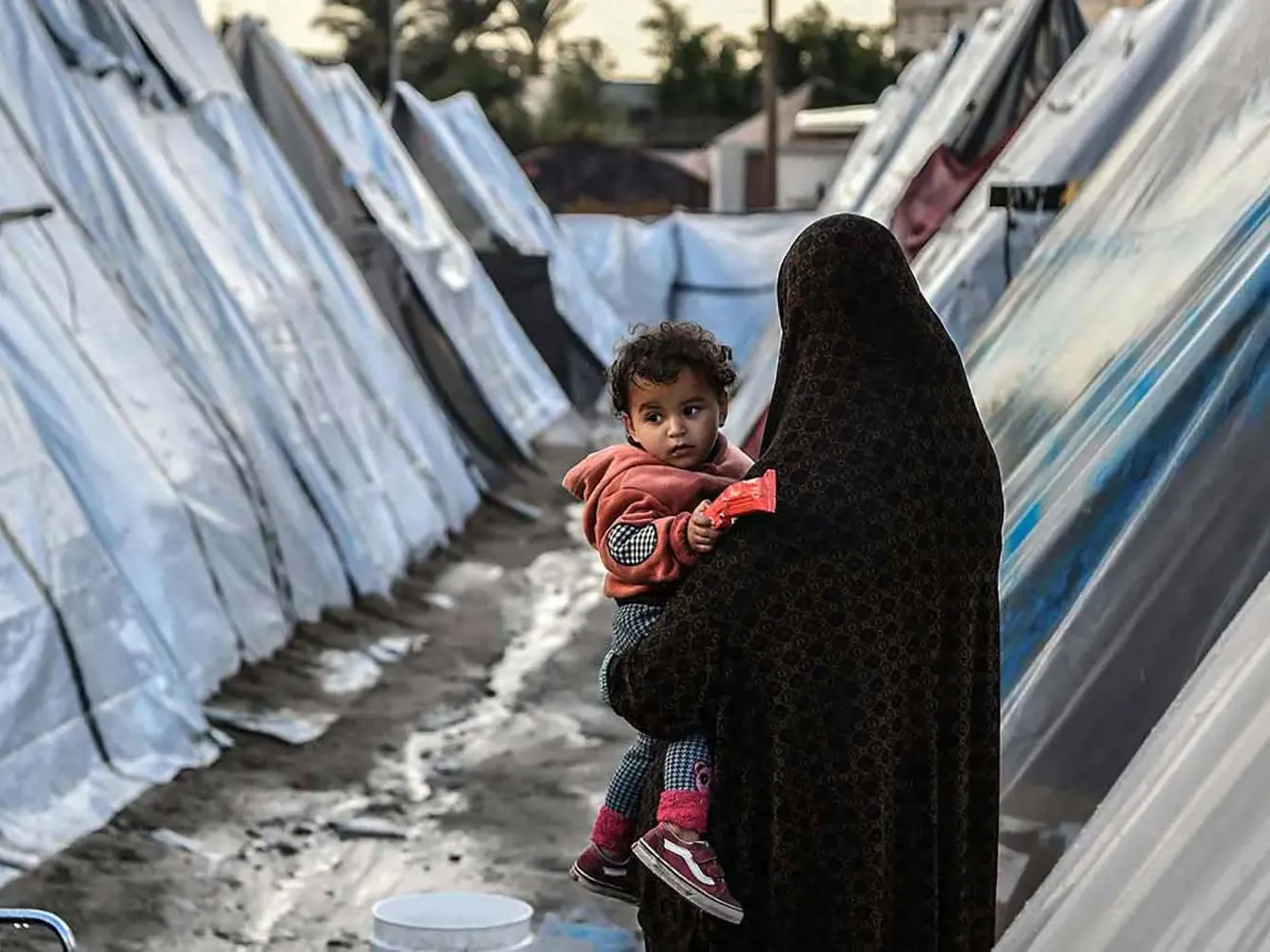 Woman and child in refugee camp in Gaza.