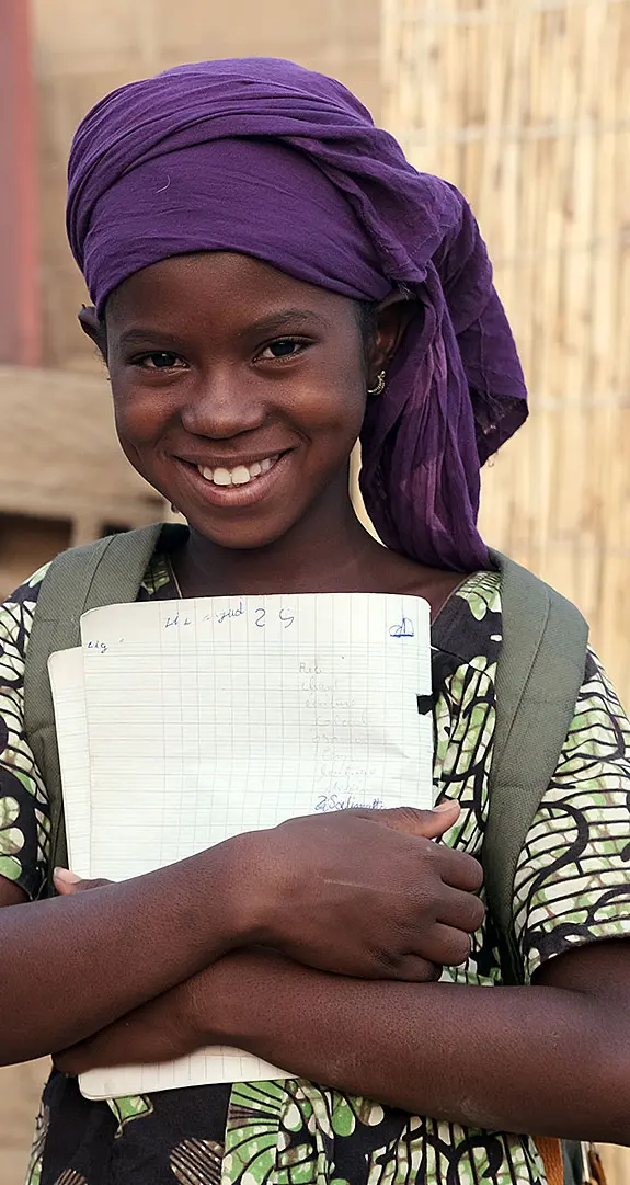 Salimata, 12, is studying hard at school in Mali to achieve her dream of becoming a dressmaker.