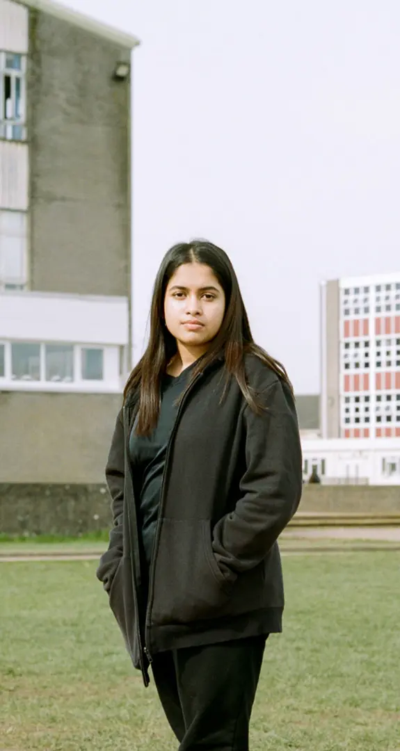 Jaiza, 13, standing outside her school in Cardiff