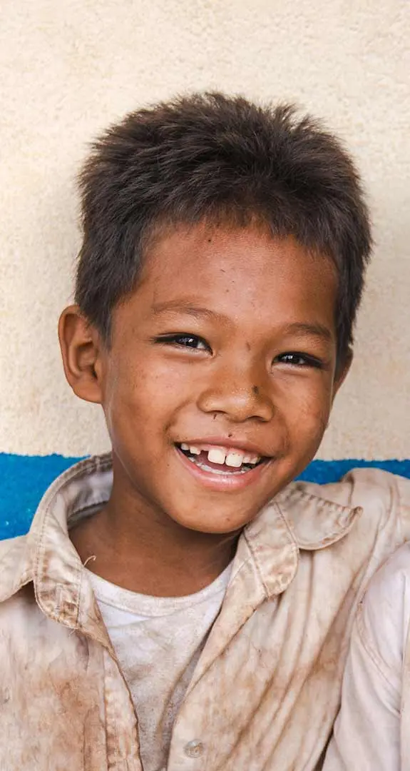 Nhem, 9, and Sokheng, 9, at their primary school in Stung Treng Province which was built by Plan International.
