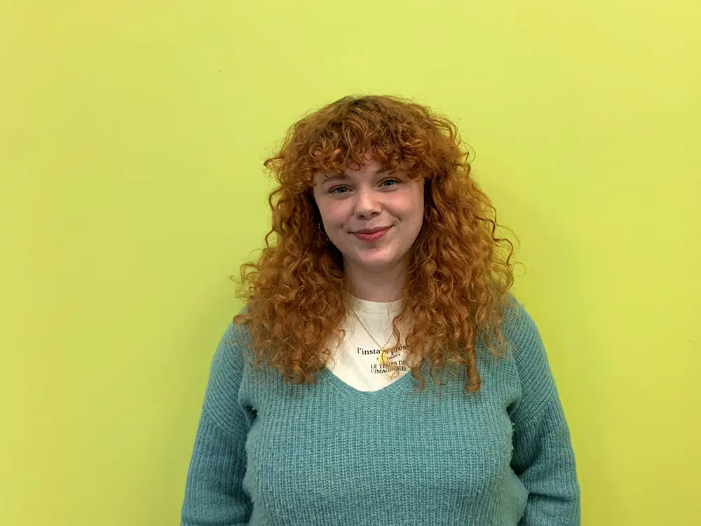A photo of Melanie who is a member for the Youth4EiE programme